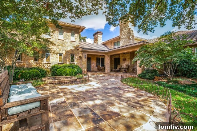 Expansive backyard with lush greenery and ample space for outdoor living