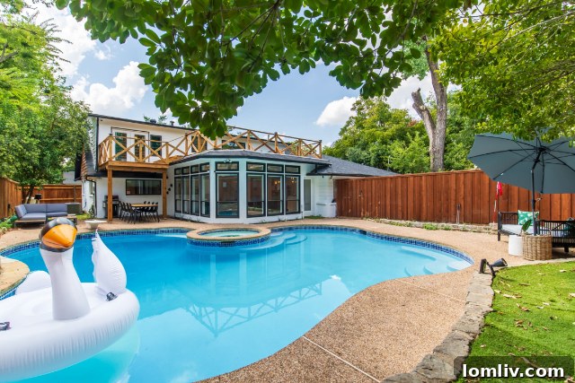 Luxurious primary bedroom with access to a private roof deck