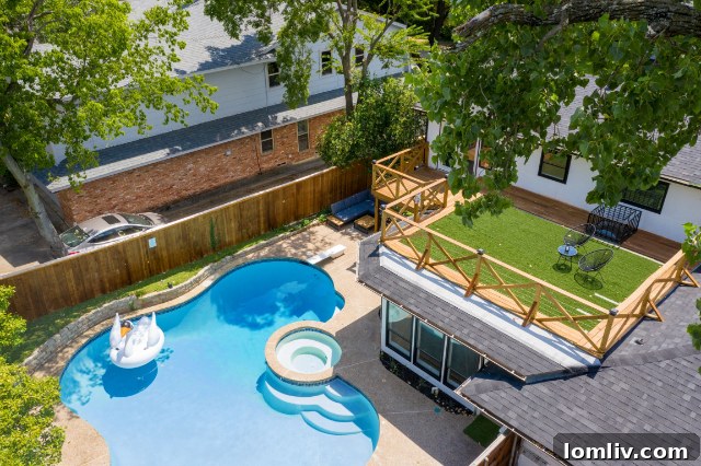 Stylish roof deck with artificial turf and views at Lake Highlands home