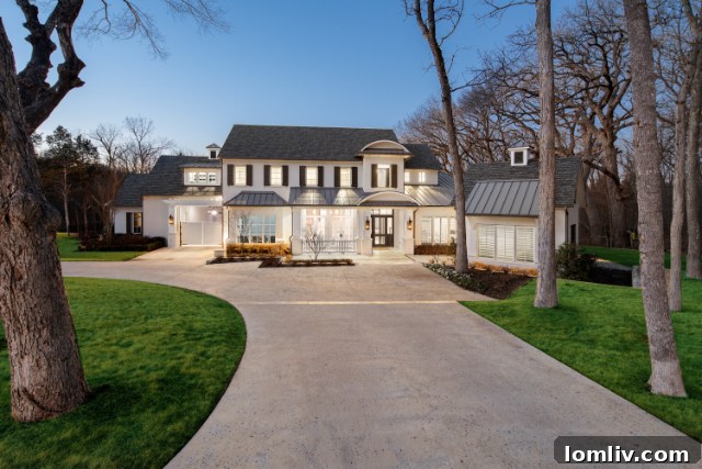 Modern luxury estate at 1050 Three Oaks Drive with a beautiful lawn