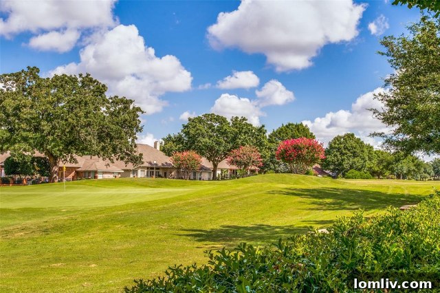 Luxurious primary bathroom with soaking tub and elegant finishes