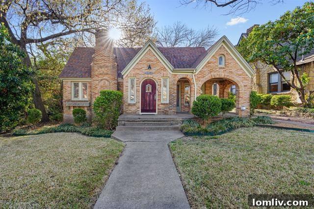 Charming Tudor home exterior at 130 Appian Way, showcasing classic architectural details and curb appeal in a picturesque setting.