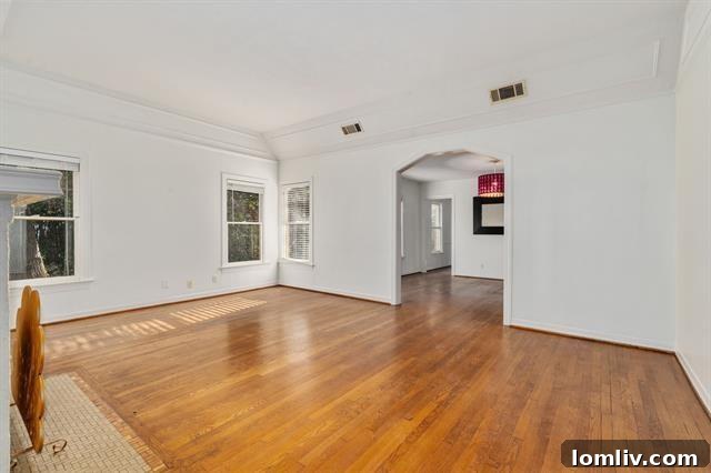 A cozy corner of the living space, highlighting architectural details like elegant arched doorways and natural light.