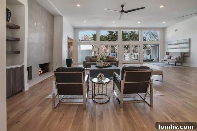 Open Concept Living Area with High Ceilings and Modern Decor