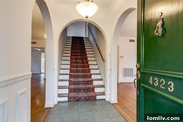 Gracious living room with fireplace and archways