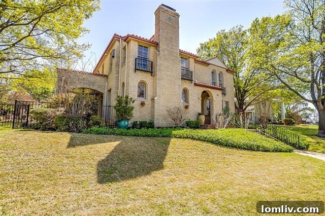 Elegant facade of the renovated historic home at 2200 Winton Terrace E., Fort Worth.