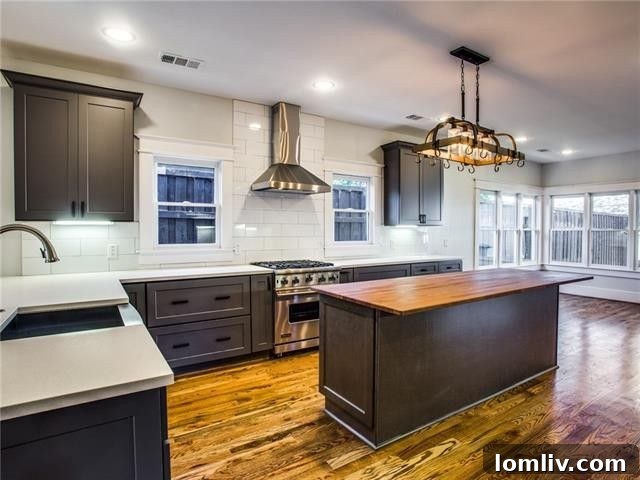 Modern kitchen with historic details in the 5307 Worth Street renovation.
