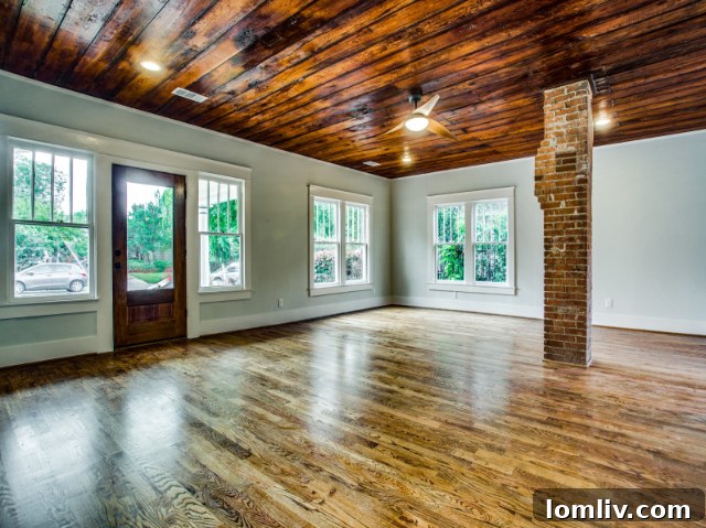 Architectural detail of the eyebrow porch molding and beadboard ceiling.