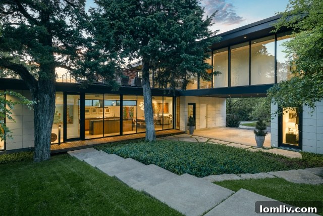 715 Kessler Woods Trail - Stunning Modern Home Exterior with Lush Greenery