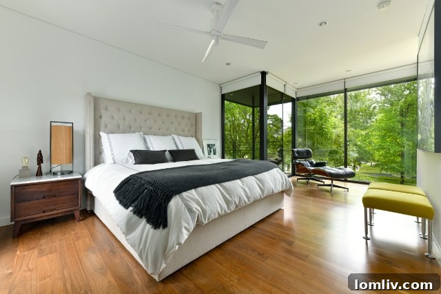 Expansive Wrap-Around Deck with Outdoor Seating and Lush Views