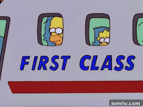 Opulent living room interior with multiple art pieces and furniture