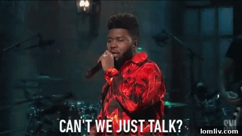 Master bedroom with vibrant colors and busy patterns