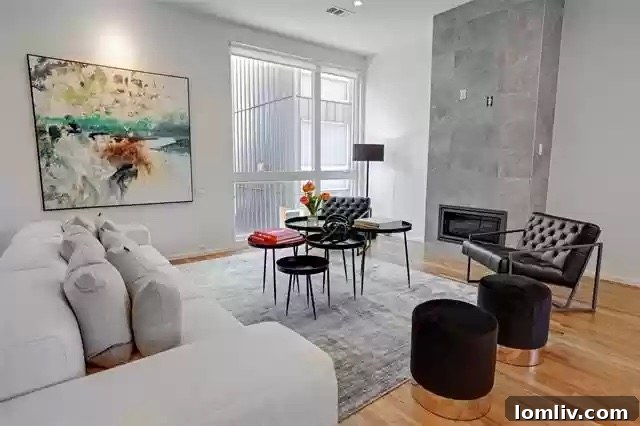 Two Coveted Oak Lawn Residences For Sale 13 Contemporary open-plan living room with high ceilings and natural light