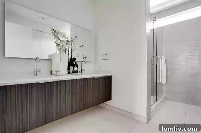 Two Coveted Oak Lawn Residences For Sale 18 Luxurious spa-like master bathroom with modern fixtures and ample space