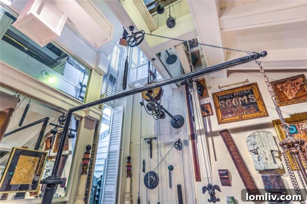 A living area featuring a large, ornate fireplace and eclectic furniture