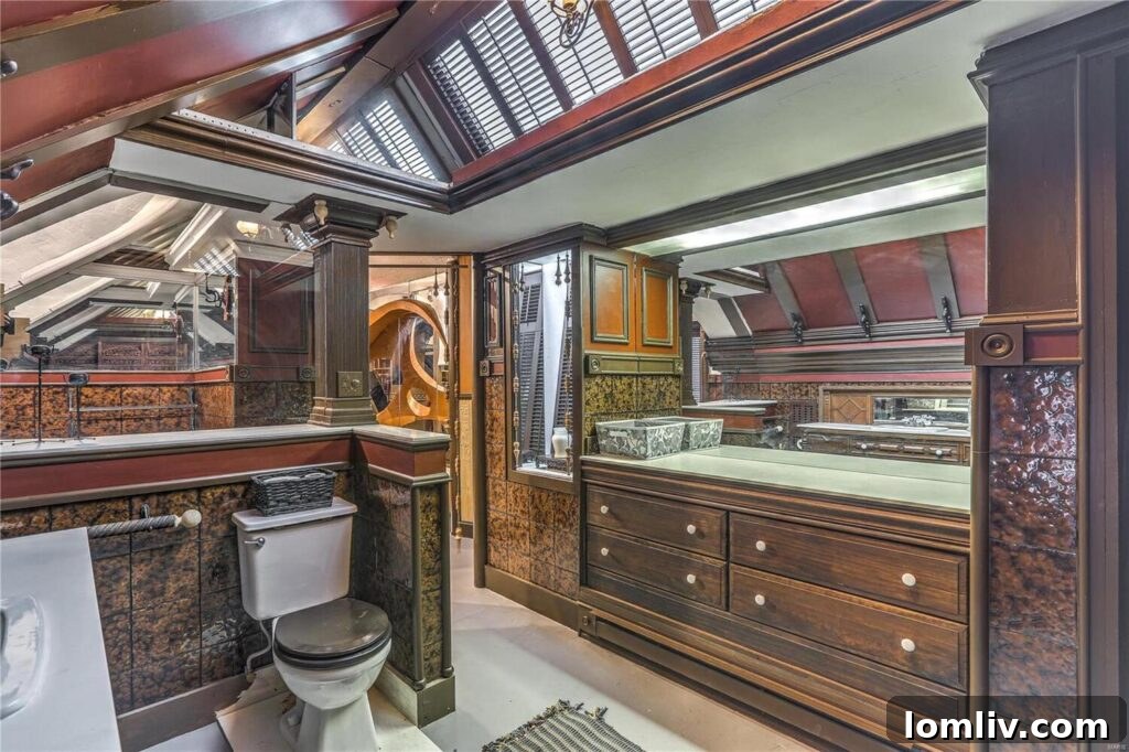 A room featuring dramatic, artistic lighting and minimalist furnishings