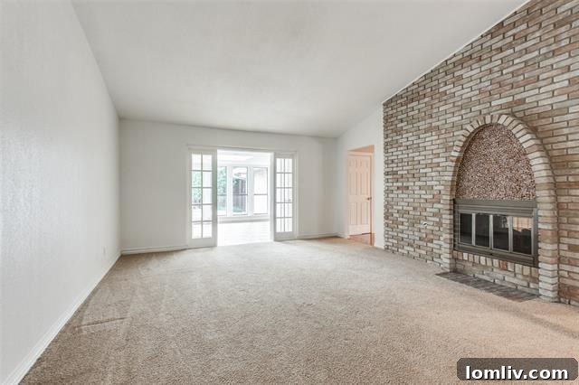 Discover Dallas Open Houses: Lower Greenville to Lake Highlands 14 Spacious great room with a see-through fireplace and built-in shelving.