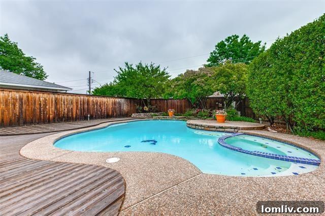 Discover Dallas Open Houses: Lower Greenville to Lake Highlands 17 Relaxing backyard with a sparkling pool and deck, perfect for summer.