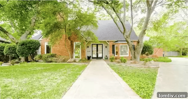 Uncover Lake Highlands: Unexpected Splurges and Smart Steals 3 Luxurious exterior of the renovated Lake Highlands home at 9909 Wood Forest Drive