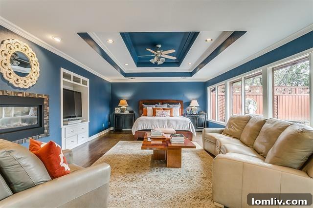 Contemporary kitchen design with red lacquer soffit and unique cabinet pulls