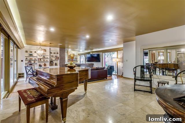 Living room with unique Roman brick fireplace and built-in shelving