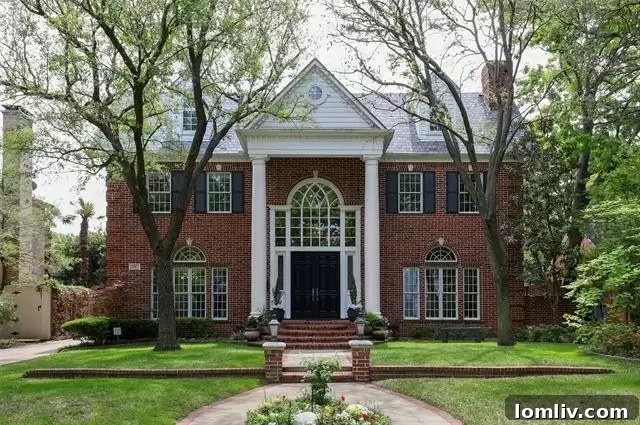 University Park's Georgian Jewel: Your Canvas for Custom Design 2 An elegant Georgian-style luxury home exterior at 4017 Centenary Avenue in Dallas's Park Cities