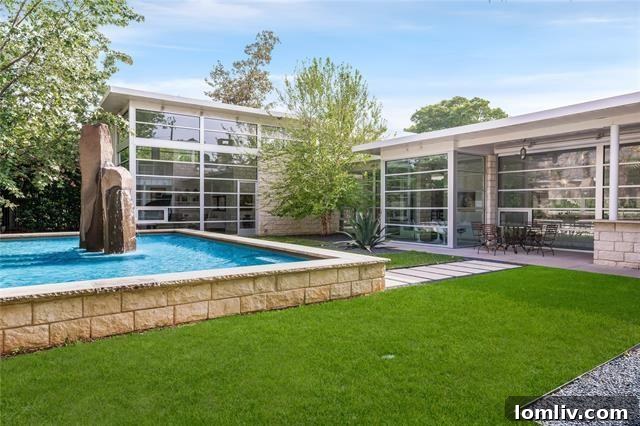 Luxurious Swimming Pool with Unique Basalt Stone Features and Pristine Landscape