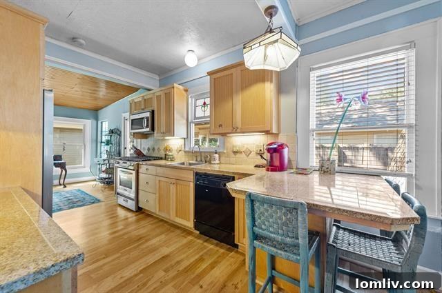 Updated Kitchen with Gas Stove in Traditional Home