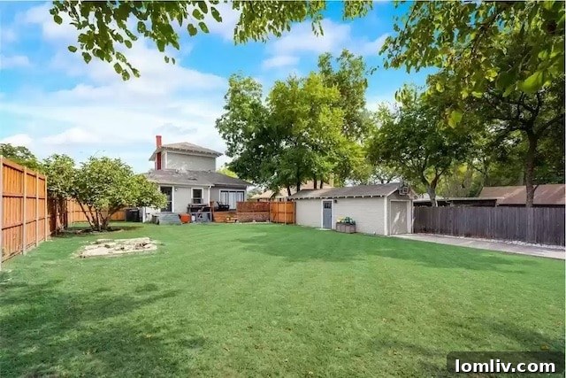Expansive Backyard with Deck in Junius Heights
