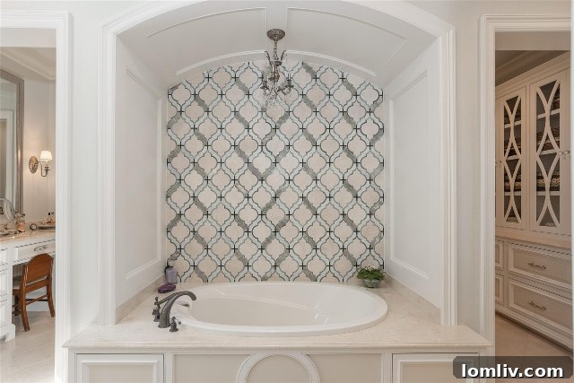 Spa-like bathroom with elegant tub and chandelier