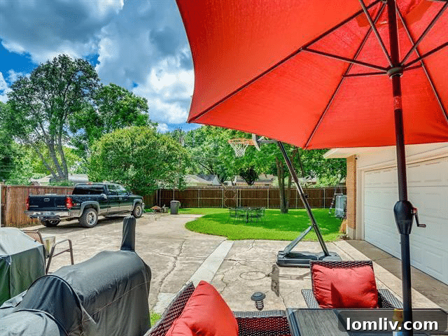 Spacious backyard with pool in Garland home