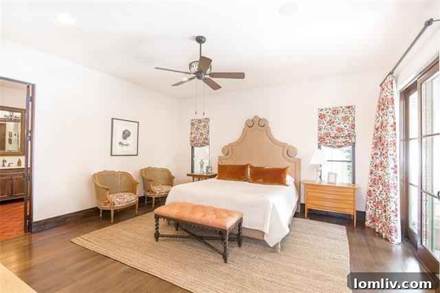 Mediterranean Masterpiece on Bunting Avenue 12 Charming powder room featuring a rococo mirror and stone basin