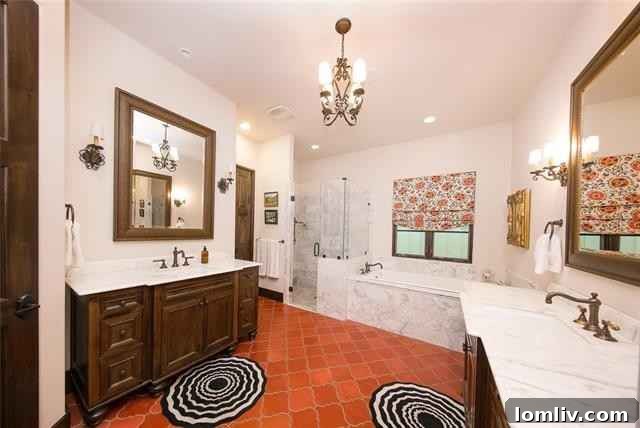 Mediterranean Masterpiece on Bunting Avenue 13 Luxurious primary bedroom on the ground floor with garden access