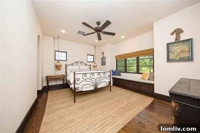 Mediterranean Masterpiece on Bunting Avenue 15 Whimsical circular staircase landing with radial vaults and dainty windows