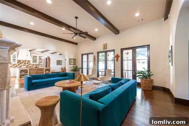 Mediterranean Masterpiece on Bunting Avenue 7 Spacious and light-filled living area connecting to the kitchen