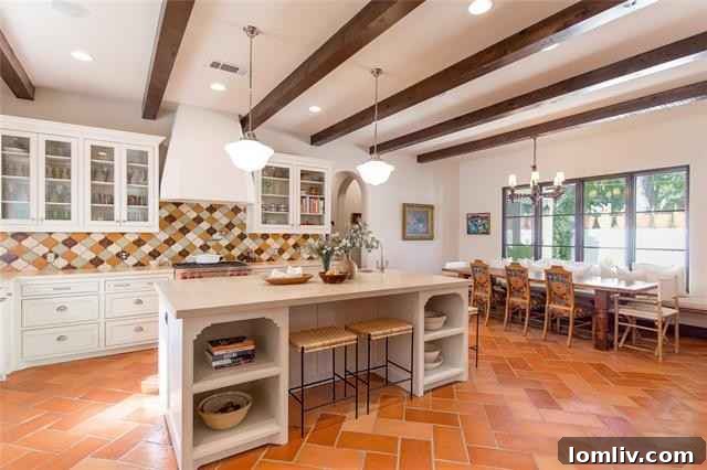 Mediterranean Masterpiece on Bunting Avenue 8 Custom French doors leading to the serene cloister-like covered patio