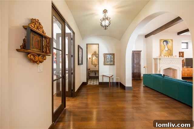 Mediterranean Masterpiece on Bunting Avenue 10 Modern kitchen island with bonus sink and high-end appliances