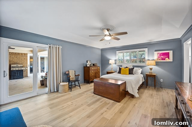 Elegant Primary Bedroom with Soft Blue Walls
