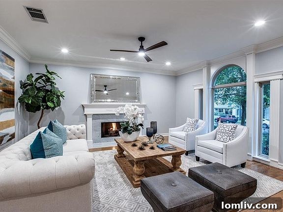 Elegant Foyer and Hardwood Staircase