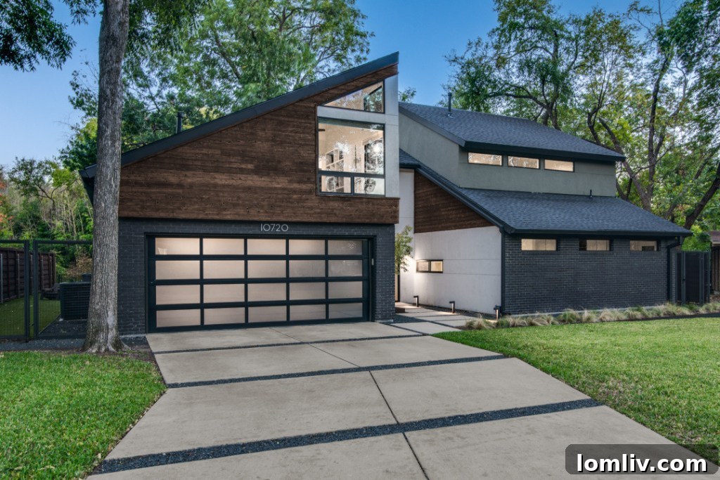 Lake Highlands contemporary home exterior with lush surroundings