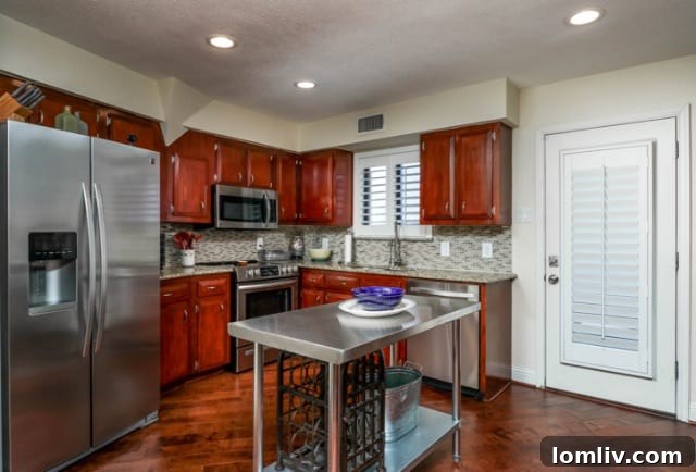 Modern Stainless Steel Kitchen in Geodesic Dome Home