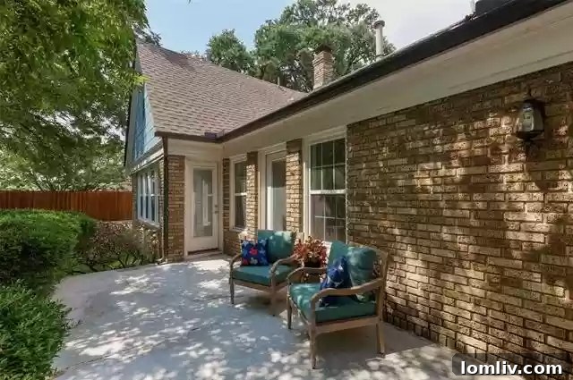 Stylish bathroom with contemporary fixtures in the renovated Tudor home, offering a spa-like experience