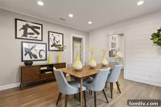 Another perspective of the charming Caruth Place Tudor cottage, highlighting its well-maintained exterior