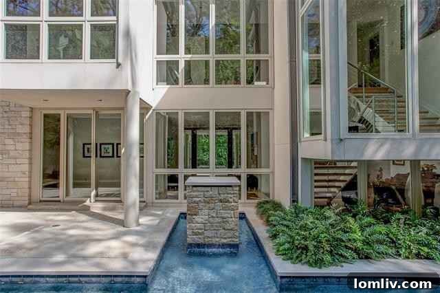 Outdoor kitchen and unique lap pool in a luxury estate