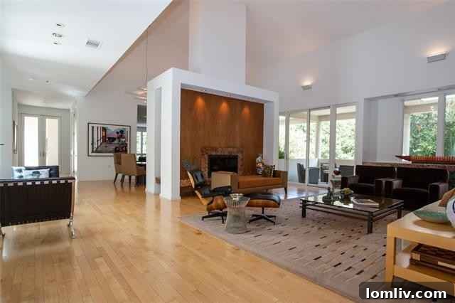 Luxurious double-height living room with unique fireplace