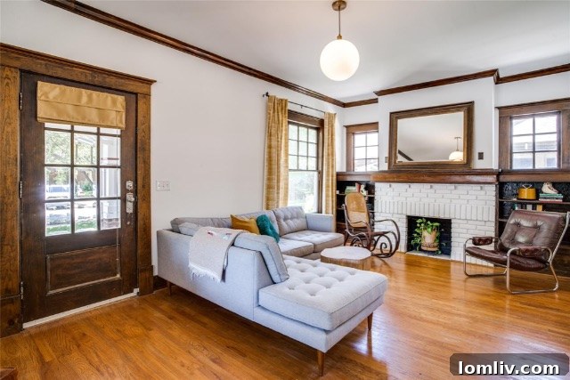 Close-up of the charming entryway and vibrant front door of the renovated Winnetka Heights home