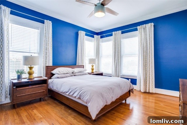 Detail shot of the stylish tile work in a renovated bathroom, showcasing a mix of classic and unique patterns