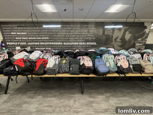 Ebby Halliday Agents Equip Every Elementary Student for Success 6 Volunteers organizing and sorting school supplies for the backpack drive