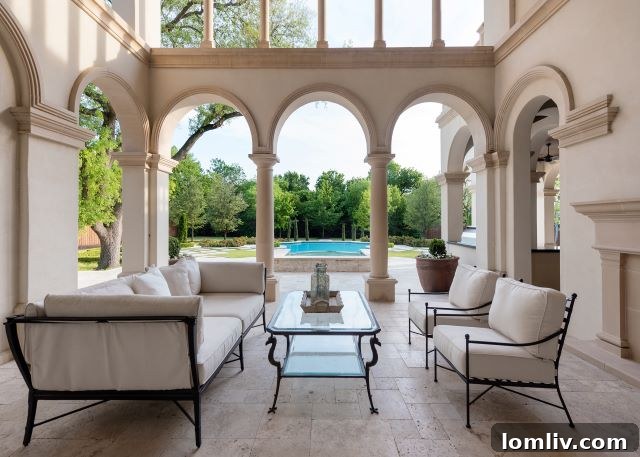 Envision Your Outdoor Oasis With Bella Custom Homes 7 Luxurious Pool Perfectly Framed by Arches of a Loggia