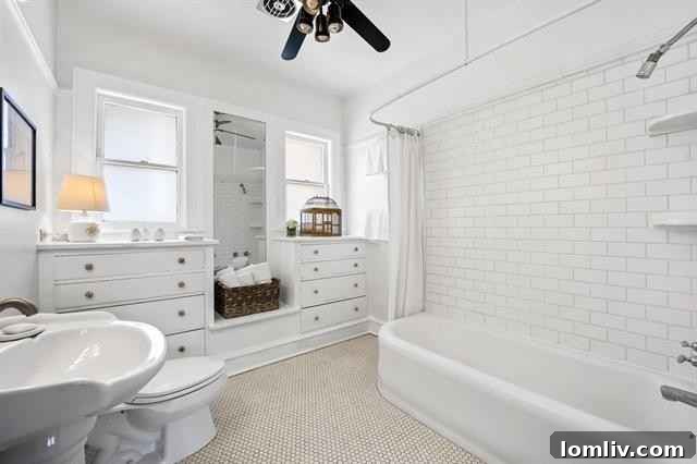 Spacious Master Bedroom with Built-ins and Hardwood Floors